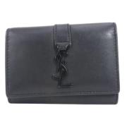 Pre-owned Leather wallets Yves Saint Laurent Vintage , Black , Dames