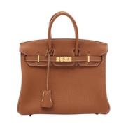 Pre-owned Leather handbags Hermès Vintage , Brown , Dames