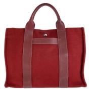 Pre-owned Canvas handbags Hermès Vintage , Red , Dames