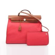 Pre-owned Leather handbags Hermès Vintage , Pink , Dames