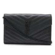 Pre-owned Leather wallets Yves Saint Laurent Vintage , Black , Dames