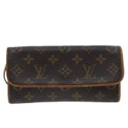 Pre-owned Canvas clutches Louis Vuitton Vintage , Brown , Dames