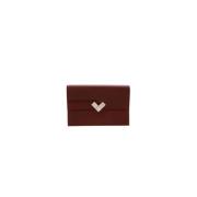 Pre-owned Canvas clutches Hermès Vintage , Red , Dames