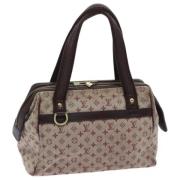 Pre-owned Canvas handbags Louis Vuitton Vintage , Red , Dames