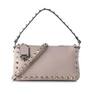 Roze Tas met Gehamerd Patroon en Gouden Rockstud Details Valentino Gar...