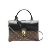 Pre-owned Canvas handbags Louis Vuitton Vintage , Brown , Dames