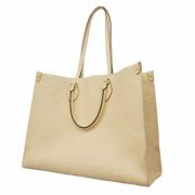 Pre-owned Fabric handbags Louis Vuitton Vintage , Beige , Dames