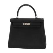 Pre-owned Leather handbags Hermès Vintage , Black , Dames