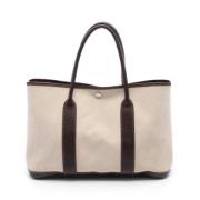 Pre-owned Leather handbags Hermès Vintage , Beige , Dames