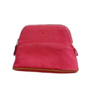 Pre-owned Canvas clutches Hermès Vintage , Pink , Dames