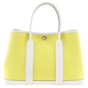 Pre-owned Canvas handbags Hermès Vintage , Yellow , Dames