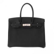 Pre-owned Leather handbags Hermès Vintage , Black , Dames