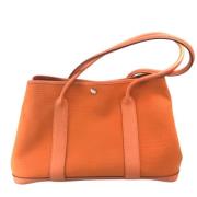 Pre-owned Canvas handbags Hermès Vintage , Orange , Dames