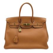 Pre-owned Leather handbags Hermès Vintage , Brown , Dames