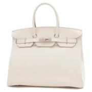 Pre-owned Leather handbags Hermès Vintage , Beige , Dames