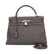 Pre-owned Leather handbags Hermès Vintage , Gray , Dames