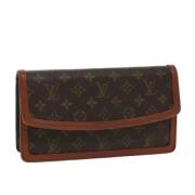 Pre-owned Canvas clutches Louis Vuitton Vintage , Brown , Dames