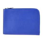 Pre-owned Leather clutches Hermès Vintage , Blue , Dames