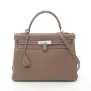 Pre-owned Leather handbags Hermès Vintage , Brown , Dames