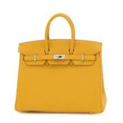 Pre-owned Leather handbags Hermès Vintage , Yellow , Dames