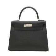 Pre-owned Leather handbags Hermès Vintage , Black , Dames