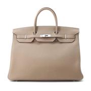 Pre-owned Leather handbags Hermès Vintage , Gray , Dames