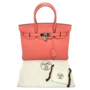 Pre-owned Leather handbags Hermès Vintage , Pink , Dames