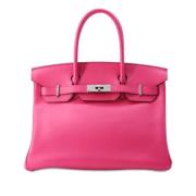 Pre-owned Leather handbags Hermès Vintage , Pink , Dames