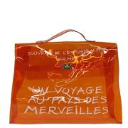 Pre-owned Vinyl handbags Hermès Vintage , Orange , Dames