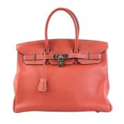 Pre-owned Leather handbags Hermès Vintage , Red , Dames