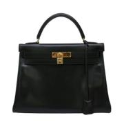 Pre-owned Leather handbags Hermès Vintage , Black , Dames