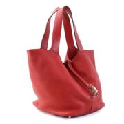 Pre-owned Leather handbags Hermès Vintage , Red , Dames