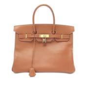 Pre-owned Leather handbags Hermès Vintage , Brown , Dames