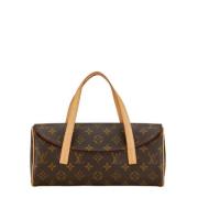 Pre-owned Canvas handbags Louis Vuitton Vintage , Brown , Dames