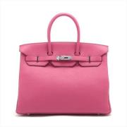 Pre-owned Leather handbags Hermès Vintage , Pink , Dames