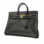 Pre-owned Leather handbags Hermès Vintage , Black , Dames