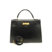 Pre-owned Leather handbags Hermès Vintage , Black , Dames