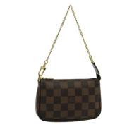 Pre-owned Canvas pouches Louis Vuitton Vintage , Brown , Dames