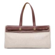 Pre-owned Canvas shoulder-bags Hermès Vintage , Beige , Dames