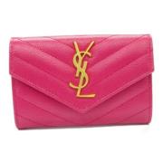 Pre-owned Leather wallets Saint Laurent Vintage , Pink , Dames