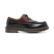 Zwarte Leren Platte Schoenen met Gelaagd Ontwerp Dr. Martens , Black ,...