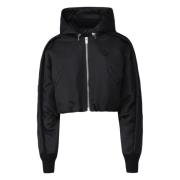 Zwarte gewatteerde jas met afneembare capuchon Moncler , Black , Dames