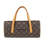 Pre-owned Canvas handbags Louis Vuitton Vintage , Brown , Dames