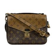 Pre-owned Canvas shoulder-bags Louis Vuitton Vintage , Brown , Dames