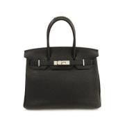 Pre-owned Leather handbags Hermès Vintage , Black , Dames