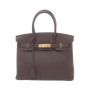 Pre-owned Leather handbags Hermès Vintage , Brown , Dames