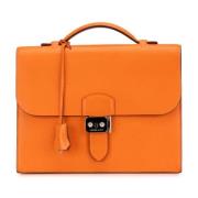 Pre-owned Leather handbags Hermès Vintage , Orange , Dames