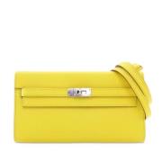 Pre-owned Leather crossbody-bags Hermès Vintage , Yellow , Dames