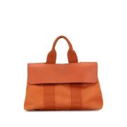 Pre-owned Canvas handbags Hermès Vintage , Orange , Dames