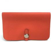 Pre-owned Leather wallets Hermès Vintage , Orange , Dames